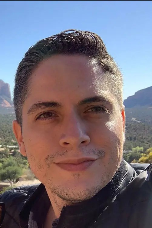 Hector M. Franco, photographed in front of a desert landscape.